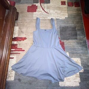 Mini sport dress that has shorts with pockets Underneath